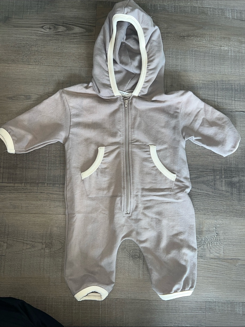 neutral taupe hooded zip-up romper with cream trim